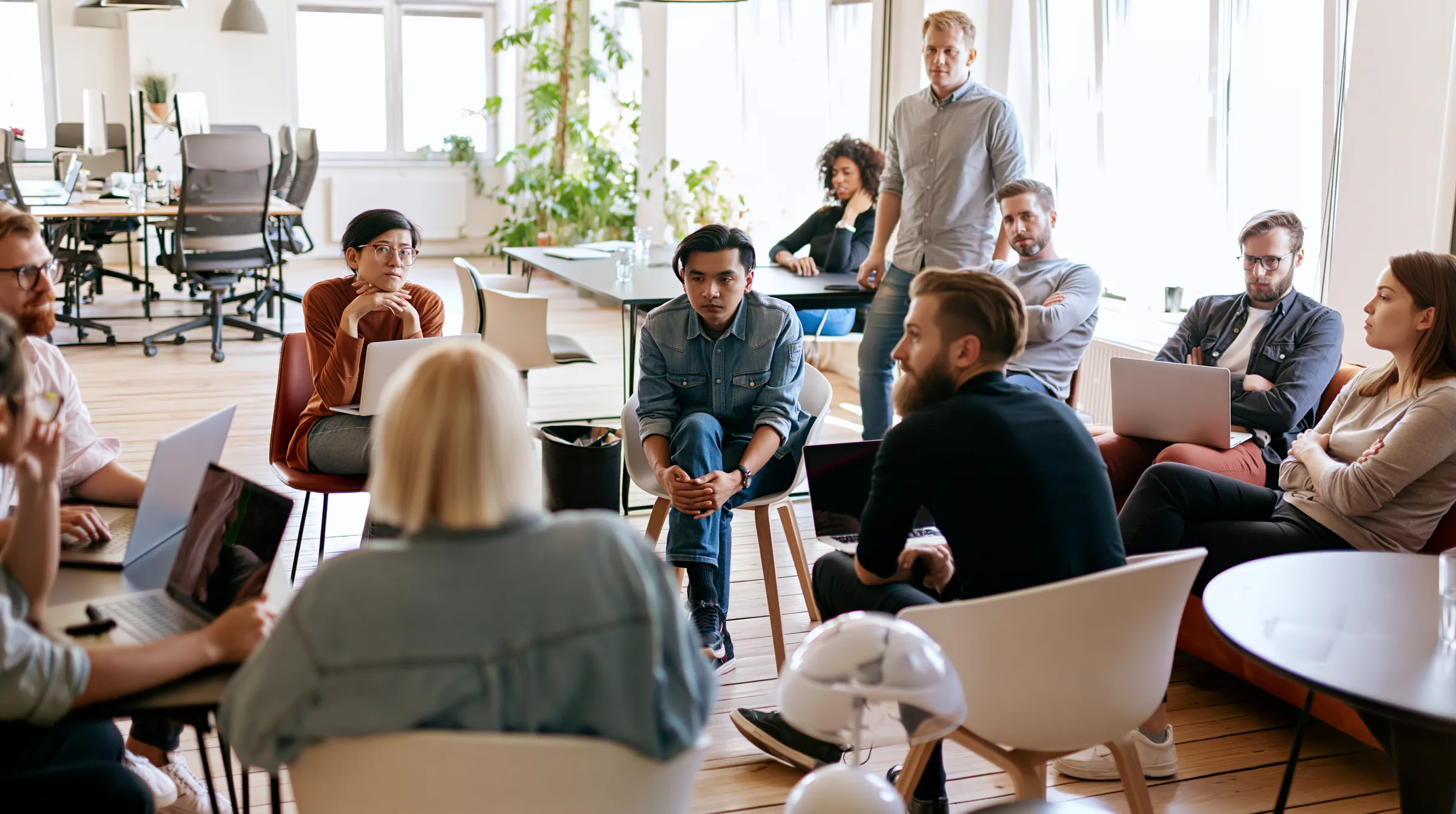 A team gathered in a bright, open office